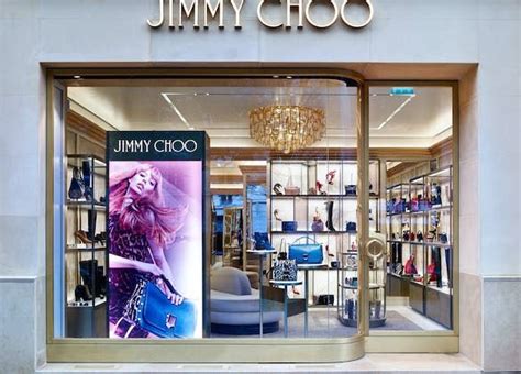 A Jimmy Choo Storefront With The Window Open