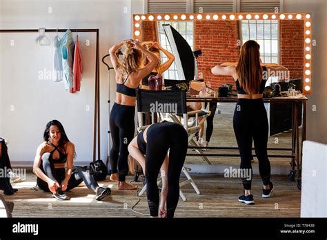 Backstage Shooting Of A Group Of Beautiful Fitness Girls Preparing To