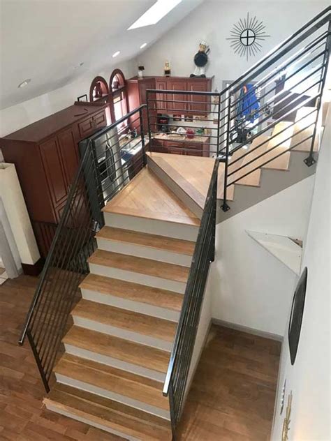From glass panels to wrought iron balusters. Indoor stair railings - Lake Sunapee Living