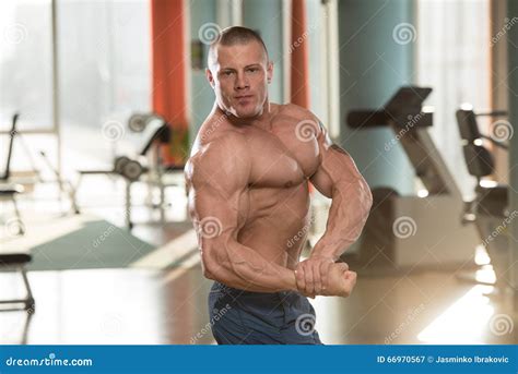 Young Bodybuilder Flexing Muscles Stock Image Image Of Build Club