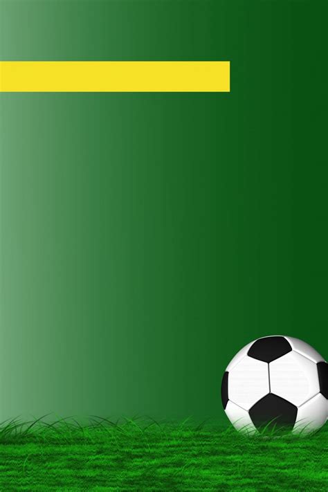 a soccer ball sitting on top of a green grass covered field next to a yellow line