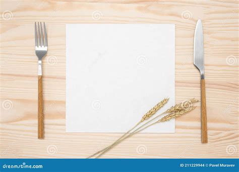 Mockup Blank Card And Cutlery Knife And Fork With White Paper For Menu