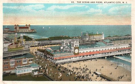 Vintage Postcard 1920s The Ocean And Piers Atlantic City New Jersey