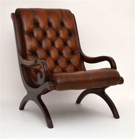 Antique Regency Style Deep Buttoned Leather And Mahogany Armchair