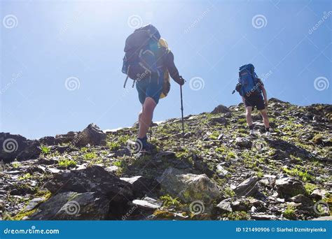 View On Two Climbers Hike Mount To Peak Of Mountain Leisure Activity