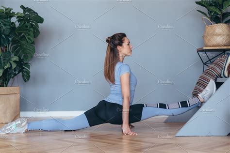 Young Fit Woman Doing The Splits High Quality People Images
