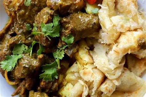 Tastetoronto Trinidadian Curry Goat And Roti Curry Goat Goat Recipes Roti