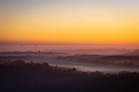Premium Photo Misty Sunset Over The Wye Valley Looking Towards The