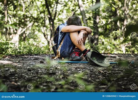 Boy Lost And Sad In The Forest Stock Photo Image Of Greenery Alone