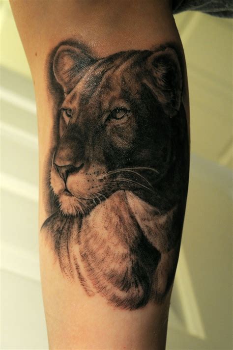 Serious Lovely Lion Tattoo On Leg Tattoomagz › Tattoo Designs Ink
