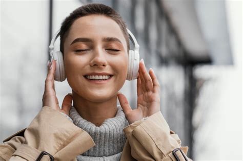 Premium Photo Woman Wearing Headphones Outdoors