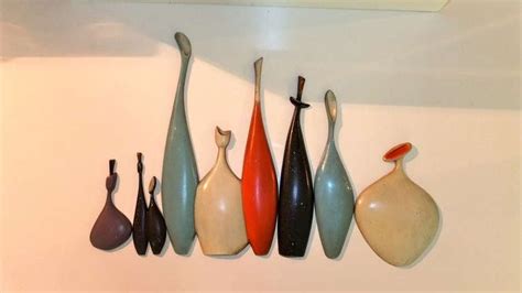 Metal Wall Plaques Of Stylized Wine Bottles By Sexton For Sale At 1stdibs Sexton Cast Iron