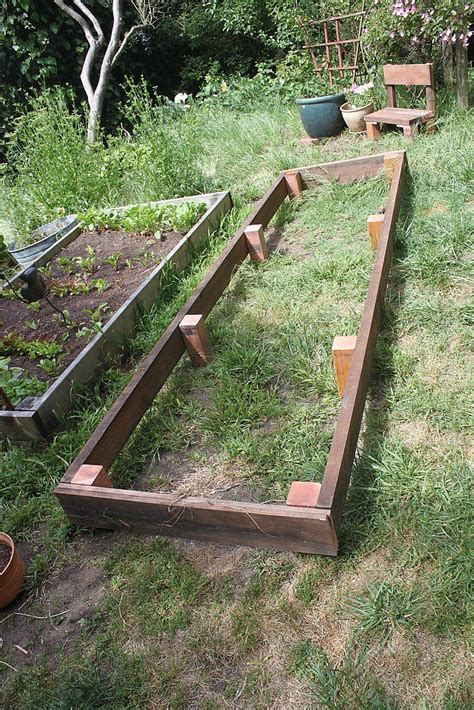 How to build a raised garden cheap. How to Build a Garden Box Out of Scrap Wood | Garden boxes, Vegetable garden design, Garden ...