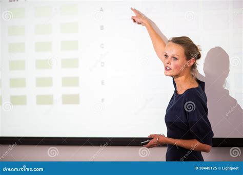 Pretty Young Business Woman Giving A Presentation Stock Image Image Of Professional Seating
