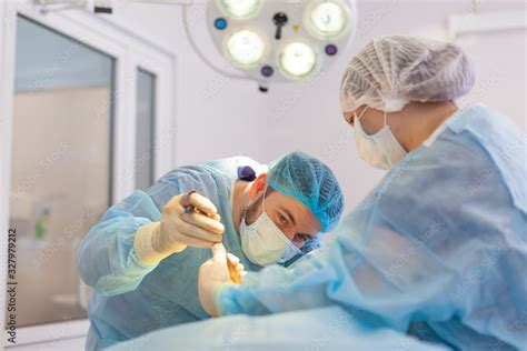 Hospital Surgeon Operates In The Operating Room Preparations Before