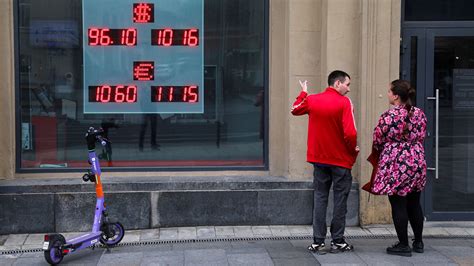 Kremlin Unfazed As Ruble Crashes Through Vs Dollar The Moscow Times