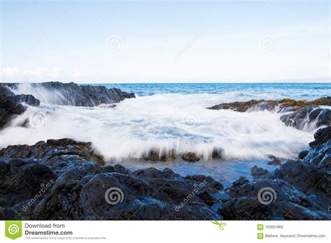Motion Blur Of Ocean Waves Crashing On Rocks Stock Photo Image Of Waves Beach 103621662