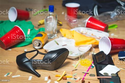 Terrible Mess After Party Trash Bottles Food Cups And Clothes On The