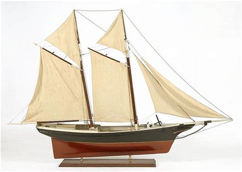 Lot Model Of A Two Masted Schooner Black And Red Hull With Gold