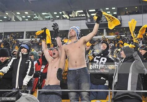 Pittsburgh Steelers Fans Brave The Cold And Take Off Their Shirts At