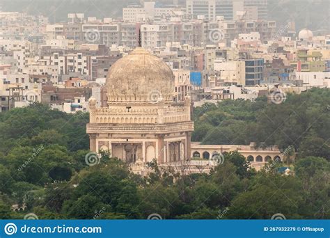 A Congested Cityscape Of Modern Hyderabad With The Qutb Shahi Tombs In