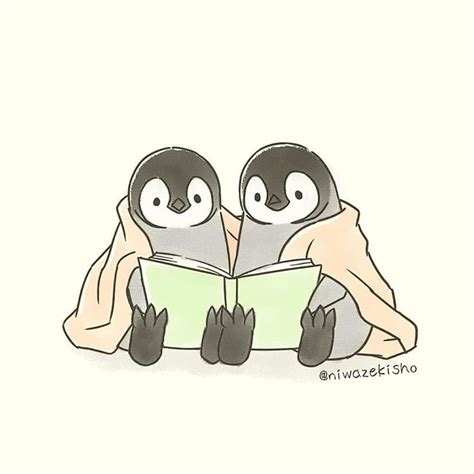 Two Penguins Are Reading A Book While Laying On The Ground With Their