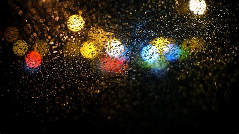 Free Photo Raindrops On Road Seen Through Car Window Abstract