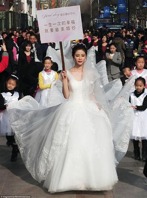 Photo Studio In China Shows Off Giant Wedding Dress With Long Train