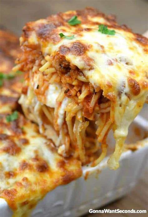 Ground beef, taco seasoning, rotel diced tomatoes and green chiles, spaghetti sauce, cottage cheese, cream cheese, sour cream, and mexican cheese blend. Million Dollar Spaghetti - The Best Blog Recipes