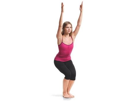 12 Yoga Poses For A Flatter Belly Chair Pose From A Standing Position