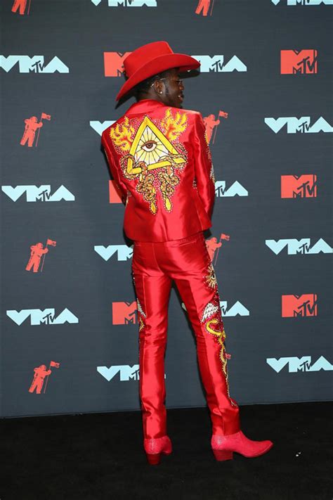 The shoes are nike air max 97s. VMAs 2019: Lil Nas X Takes a Victory Lap in High Style | Tom + Lorenzo