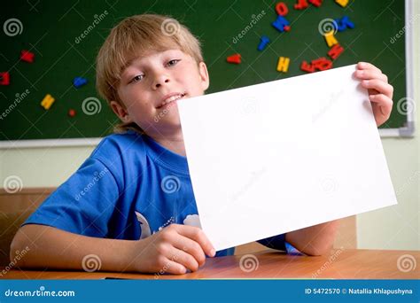 Boy Holding Up A White Sheet Of Paper Stock Photo Image Of People