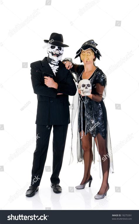 Attractive Young Halloween Couple Mafia Suit And Witch Costume Studio