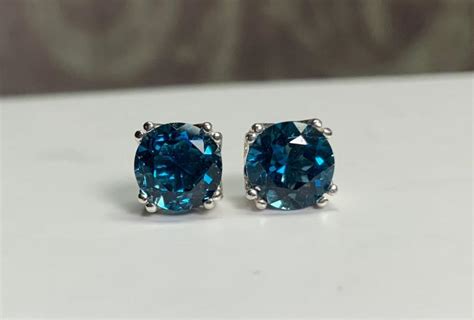 Round Natural London Blue Topaz Set In Sterling Silver Double Prong