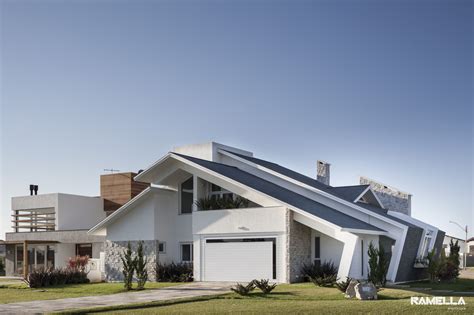 Dreamstime is the world`s largest stock photography community. Pitched Roofline on House Morphs into Angled Facade