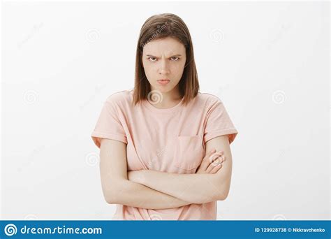 Woman Feeling Offended And Insulted Staring From Under Forehead With