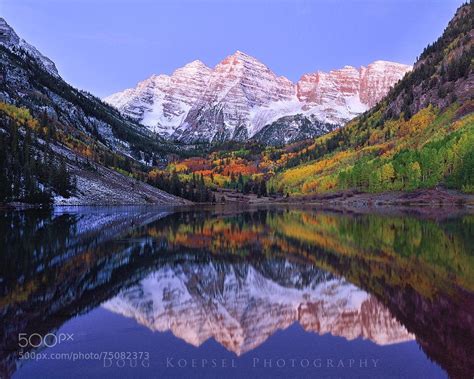 The Snow Covered Maroon Bells At Dawn Last Fall Above Aspen Colorado