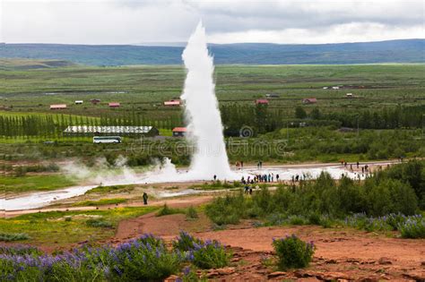 Tourists Are Looking Eruption Of Strokkur Geyser Iceland Stock Photo
