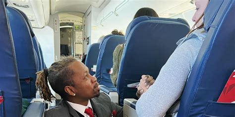 flight attendant goes viral for comforting a nervous passenger on a flight indy100