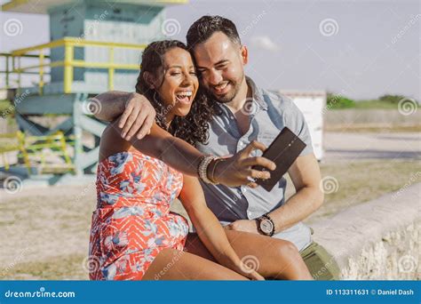 Excited Couple Taking Selfie On Seafront Stock Image Image Of Lounge Multiracial 113311631