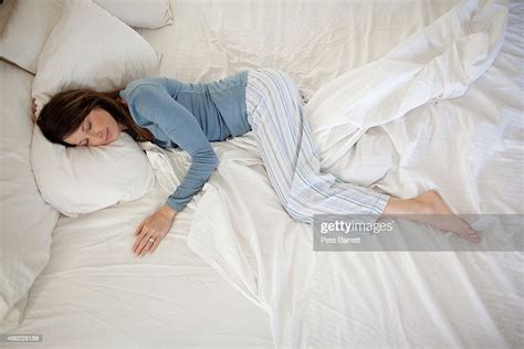 Middle Aged Woman Sleeping In Bed Bildbanksbilder Getty Images
