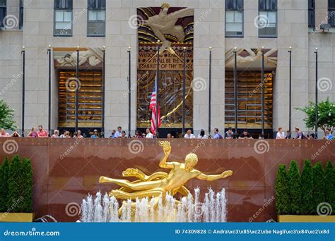 Gold Prometheus Statue In Lower Plaza With Rockefeller Center En
