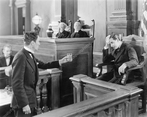 Lawyer And A Witness In A Courtroom — Stock Photo © Everett225 12299569