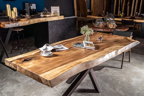 Get the free plans from the link below and visit the tutorial for the complete instructions. Suar Wood Dining Table - Masons Home Decor