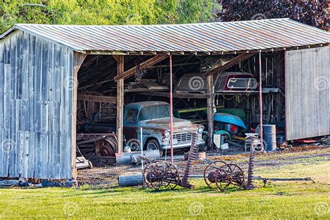 An Old Rusted Pickup Truck In A Shed On A Farm Stock Photo Image Of