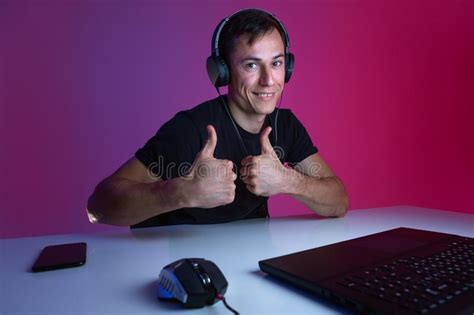 Excited Gamer In Happy To Win In A Video Game On Computer In A Dark