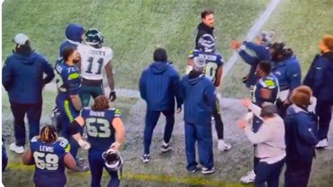eagles a j brown seahawks staffer have sideline confrontation with big dom in suite