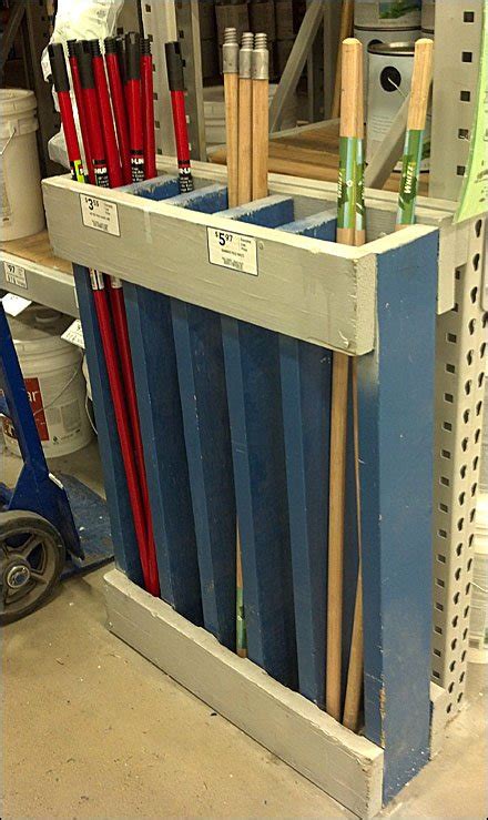 Diy mop and broom organization. 2x6 Broom Handle Rack - Fixtures Close Up
