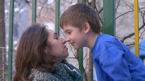 Son And Mom Kissing Mother Kiss Her Son Outdoor Stock Video Adobe Stock