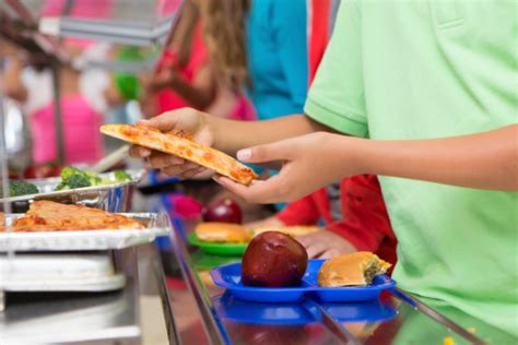 Elementary Students Choosing Healthyunhealthy Food In School Cafeteria